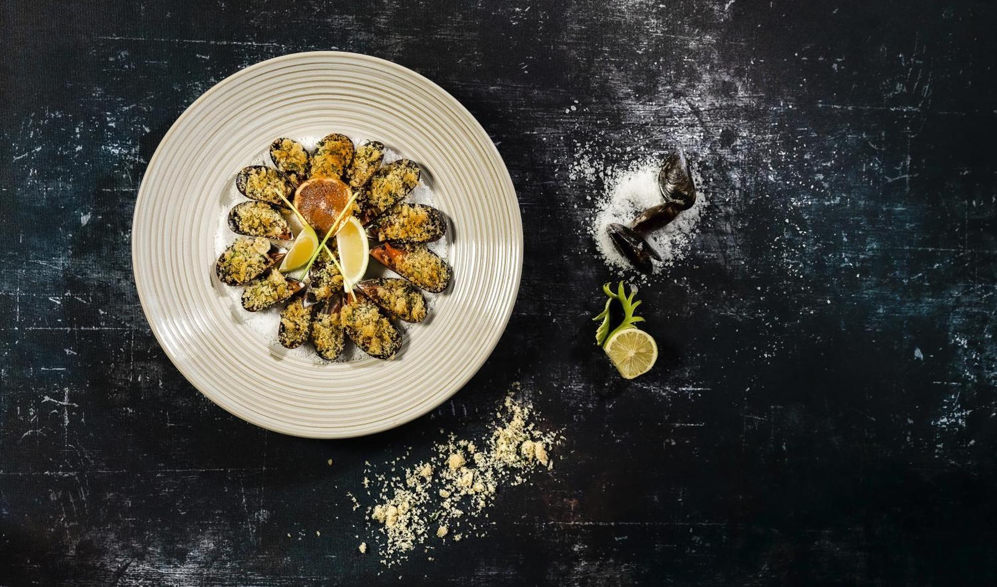 โมเวนพิครีสอร์ตแอนด์มารีนสปา ซูสส์ Hotel ซุส ภายนอก รูปภาพ A plate of grilled scallops